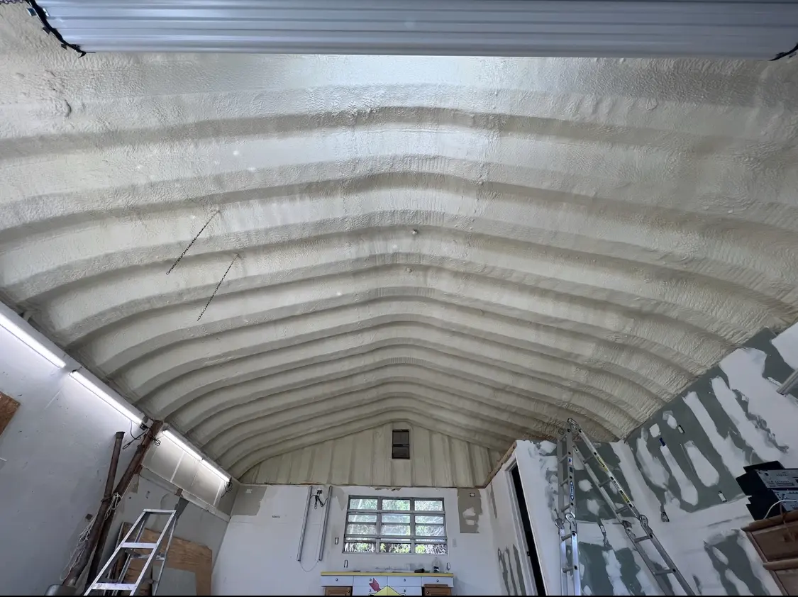 Spray polyurethane foam applied to the underside of a metal roof deck in Gulf Hills